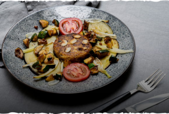 Galette sur lit de légumes d'été